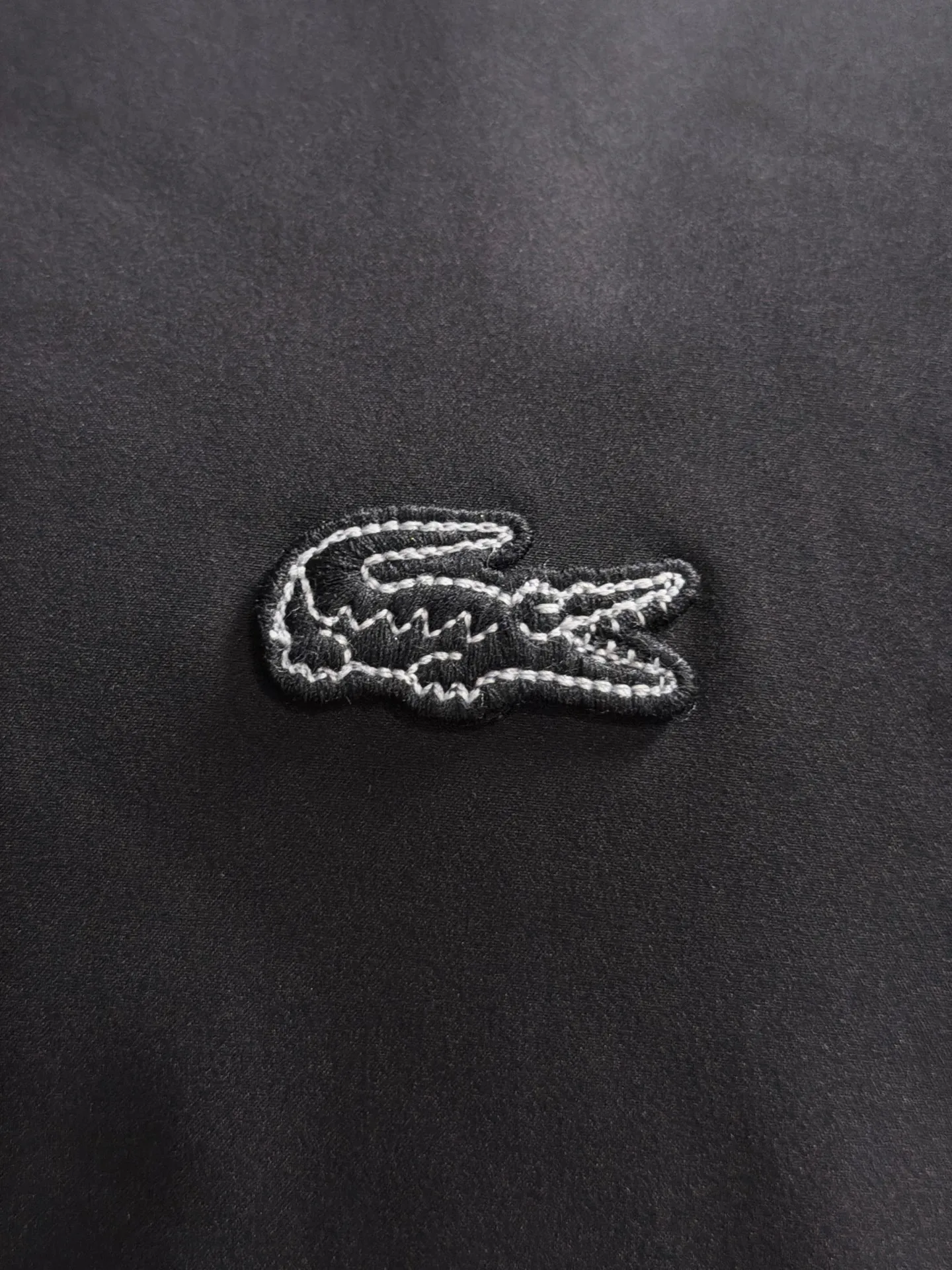 LACOSTE French crocodile Lacoste 2026 Newest Arrival windbreaker jacket. Customized dyed fabrics, overall casual and upscale. The fabric texture is relatively thin, very light, comfortable on the upper body, and suitable for autumn and winter wear. Simple lines, customized hardware zippers, elegant and concise style, lightweight and comfortable to wear, very urban luxury and low-key elegance, with a casual and lazy feeling, the upper body effect is very good, quite wide and stylish, natural drape, simple and elegant! Top luxury Classic The style item is gentle and high-end, quiet but full of power. It perfectly conveys the brand's sense of trend and recognition. The upper body is super cool and stylish, and extremely luxurious. It shows your rank, strength and taste from all aspects! The overall grade is even more obvious. The upper body is comfortable and unconstrained, with a casual and loose effect. Size:48-56
